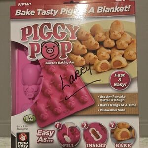 NIB Piggy Pop Silicone Baking Pan.